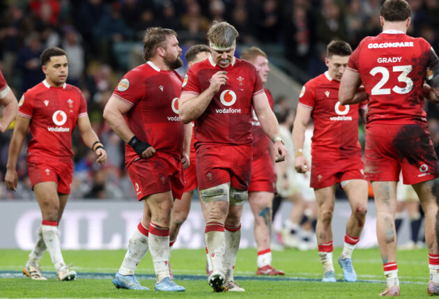 Aaron Wainwright and other Wales players looking dejected after the 2026 Six Nations defeat against England