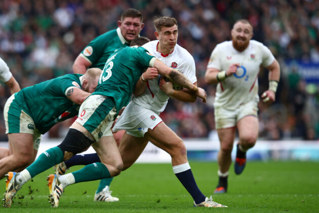 ack van Poortvliet of England is tackled by Garry Ringrose of Ireland during the Six Nations 2026 match between England and Ireland