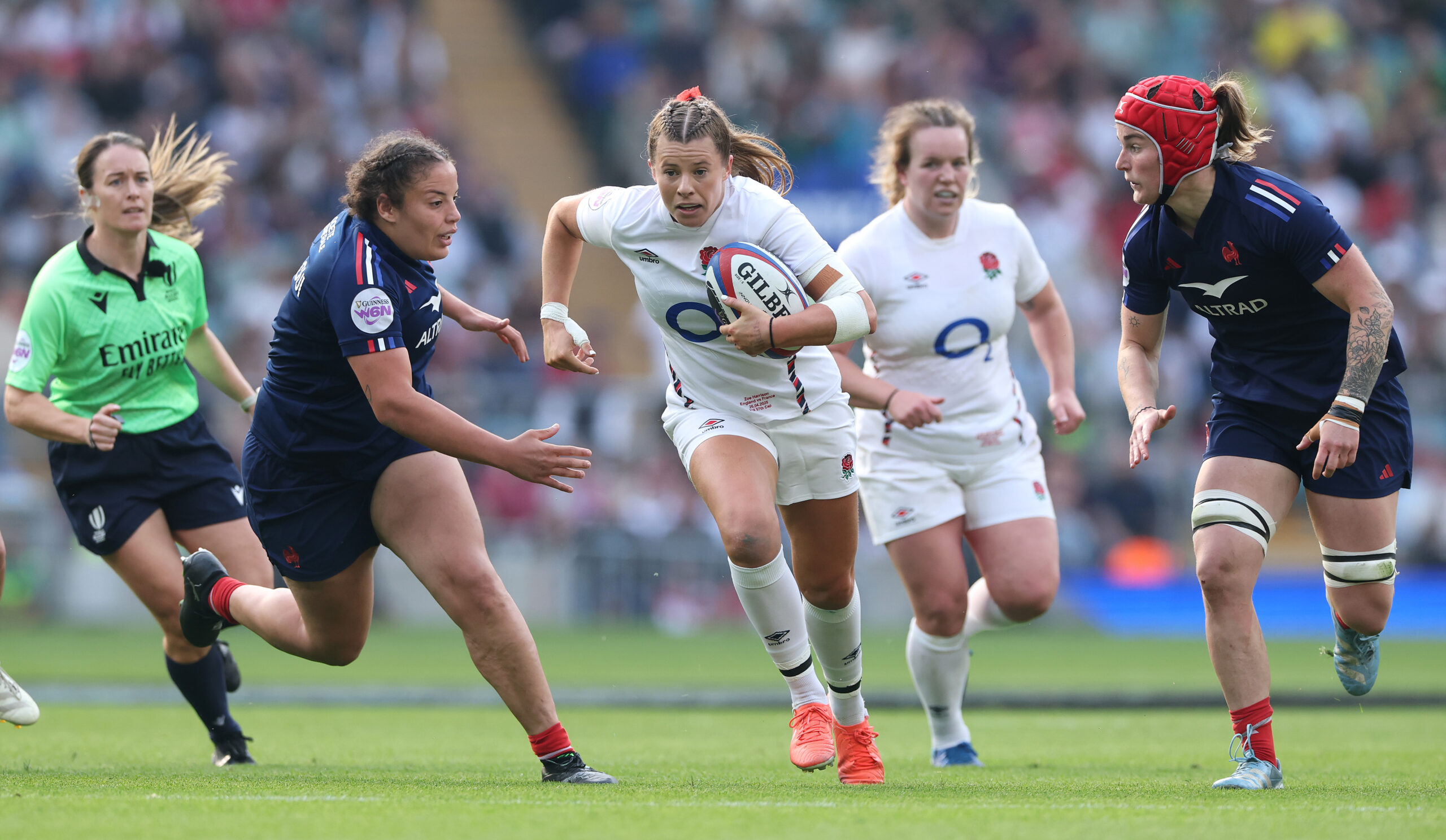 England's Zoe Harrison runs with the ball during the 2025 Women’s Six Nations encounter with France