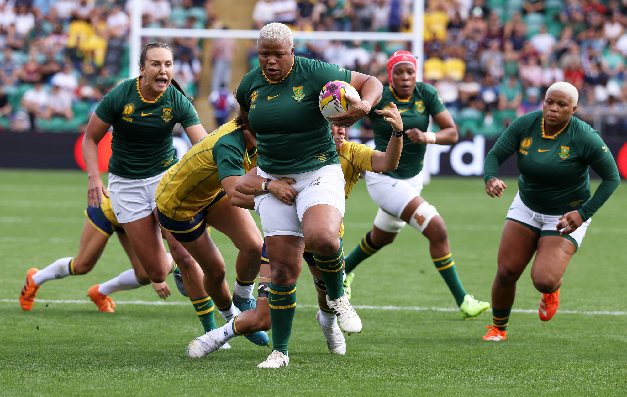 South Africa's Aseza Hele carries the ball during the Women's Rugby World Cup 2025 match against Brazil