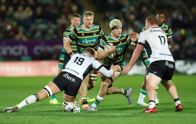 Northampton Saints' Henry Pollock runs into tackles from Saracens' Nick Isiekwe and Rhys Carre during the October 2025 Gallagher Prem match.