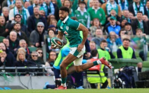 Ireland's Robert Baloucoune on his way to scoring a try against Scotland during the 2026 Six Nations
