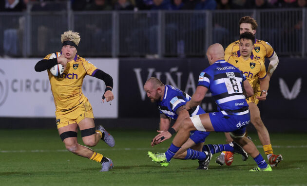 Henry Pollock of Northampton Saints runs with the ball during the December 2025 PREM Rugby match against Bath.