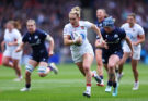 England's Meg Jones runs with the ball during the April 2026 Women's Six Nations match against Scotland
