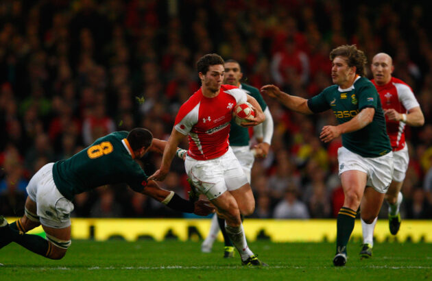 Wales winger George North races through the challenges of Pierre Spies (l) and Francois Steyn during the International match between Wales and South Africa at Millennium Stadium on November 13, 2010 in Cardiff, Wales. (Photo by Stu Forster/Getty Images)
