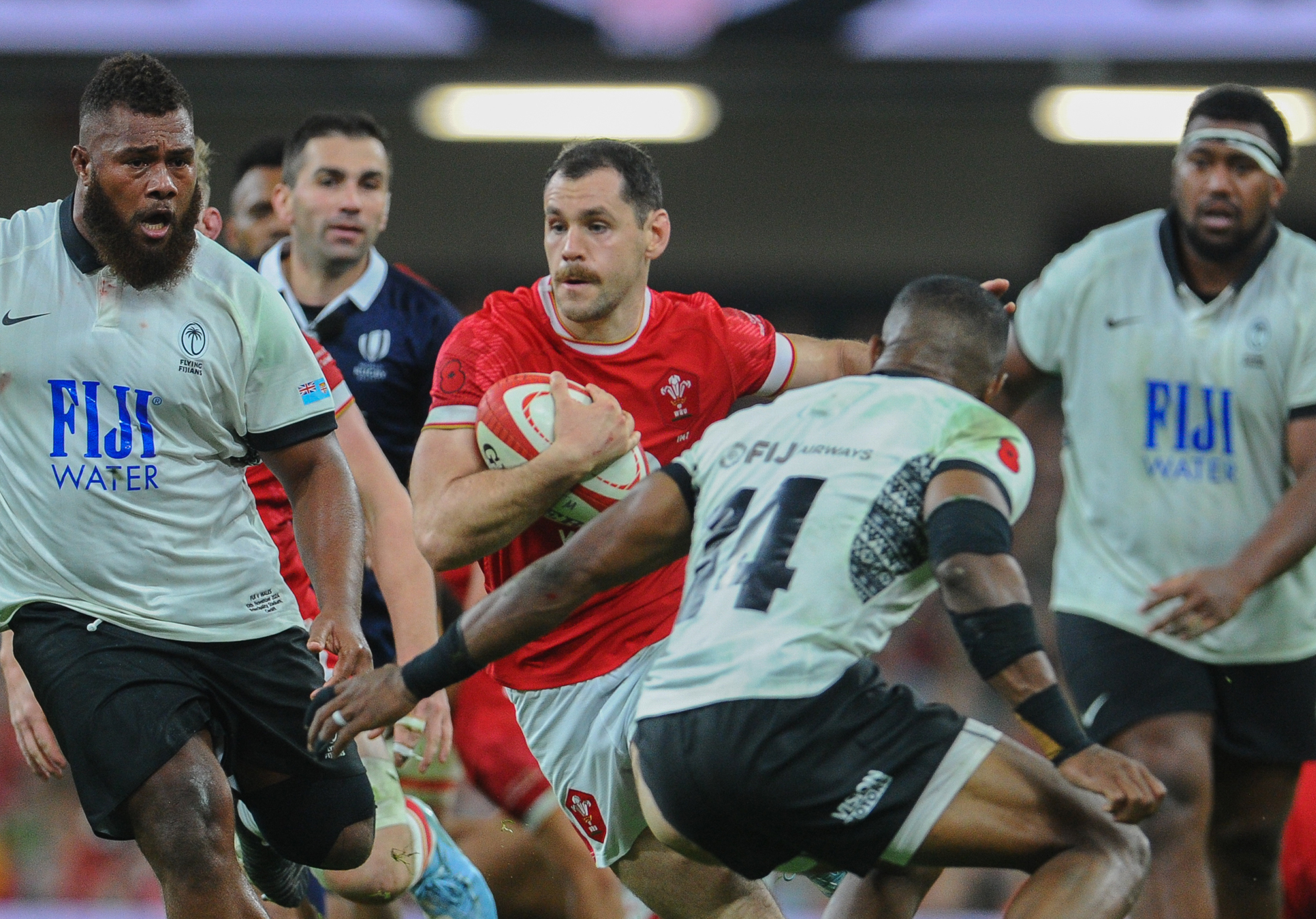 Wales' Tomos Williams carries the ball into contact during the November 2024 match against Fiji