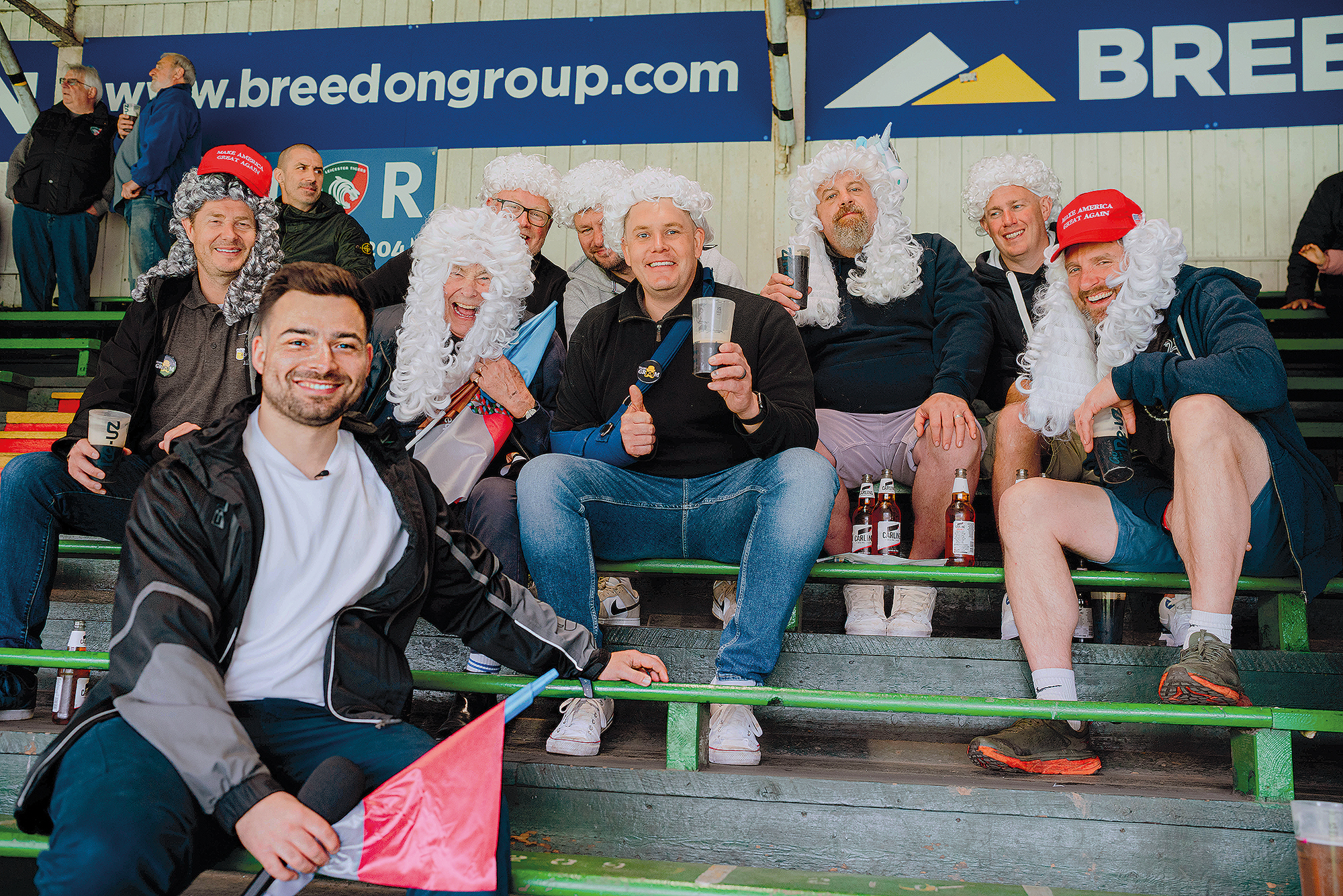 Rugby World's Josh Graham with Harlequins fans in fancy dress during the April 2025 match in Leicester.