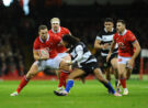 Wales' George North evades a tackle during the November 2023 match against the Barbarians