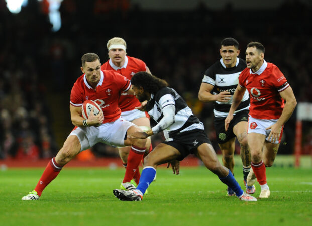 Wales' George North evades a tackle during the November 2023 match against the Barbarians
