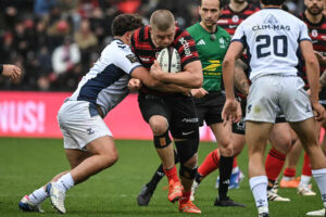 Jack Willis of Toulouse runs into a tackle during his team's March 2026 Top 14 match against Montpellier