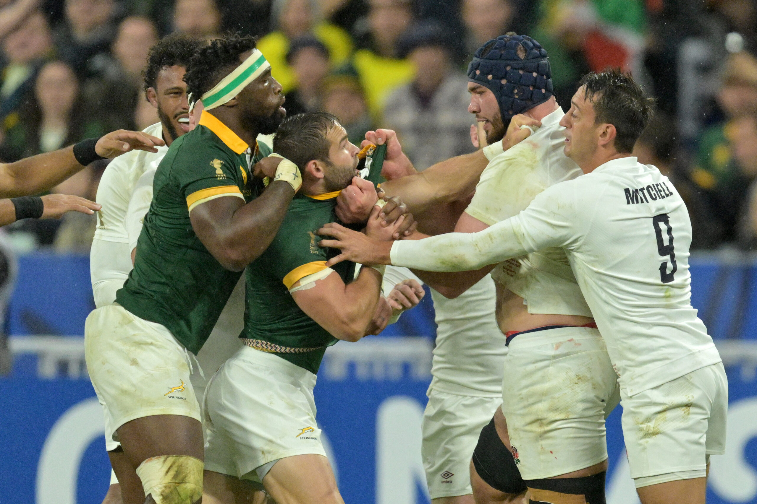 Cobus Reinach of South Africa argues with George Martin of England. (Photo by Lionel Hahn/Getty Images)