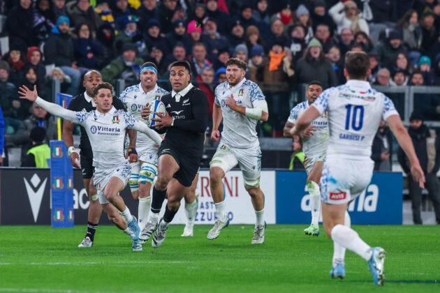 New Zealand's Rieko Ioane runs with the ball during the November 2023 international against Italy in Turin