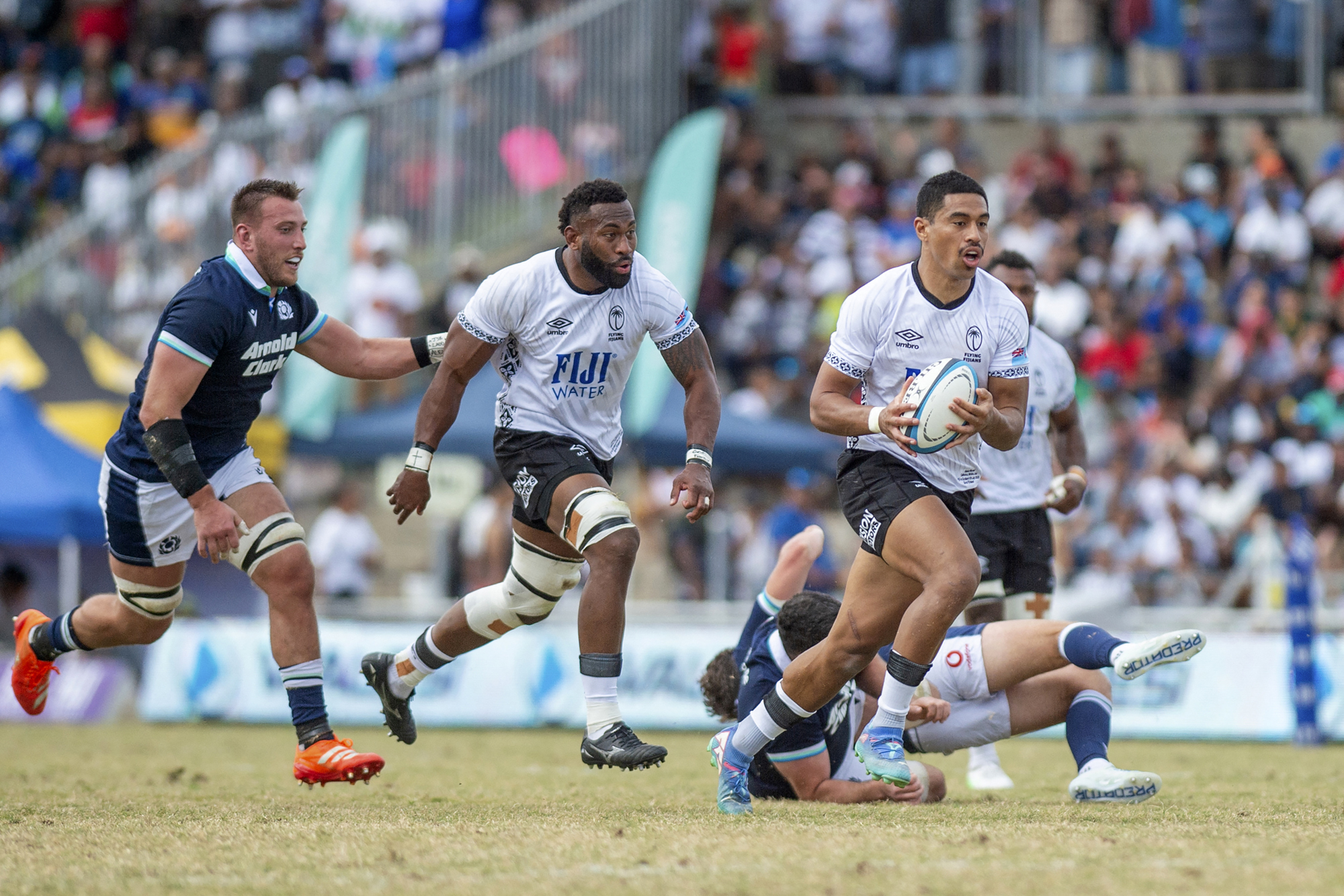 Fiji's Salesi Rayasi runs the ball towards the try line during his team’s July 2025 victory over Scotland in Suva.