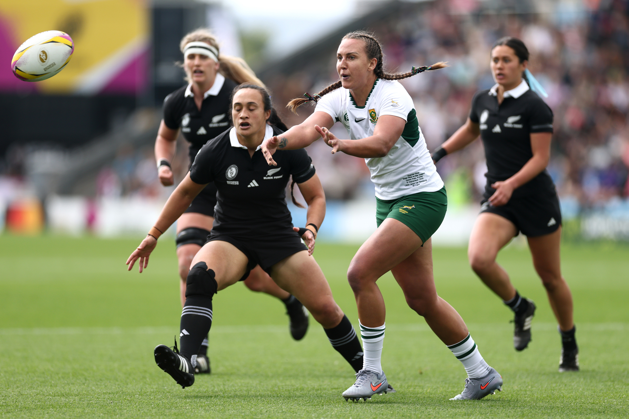 South Africa's Libbie Janse van Rensberg passes the ball during the 2025 World Cup quarter-final against New Zealand