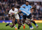 England's Immanuel Feyi-Waboso tries to evade a tackle from Fiji players during the November 2025 international at Twickenham
