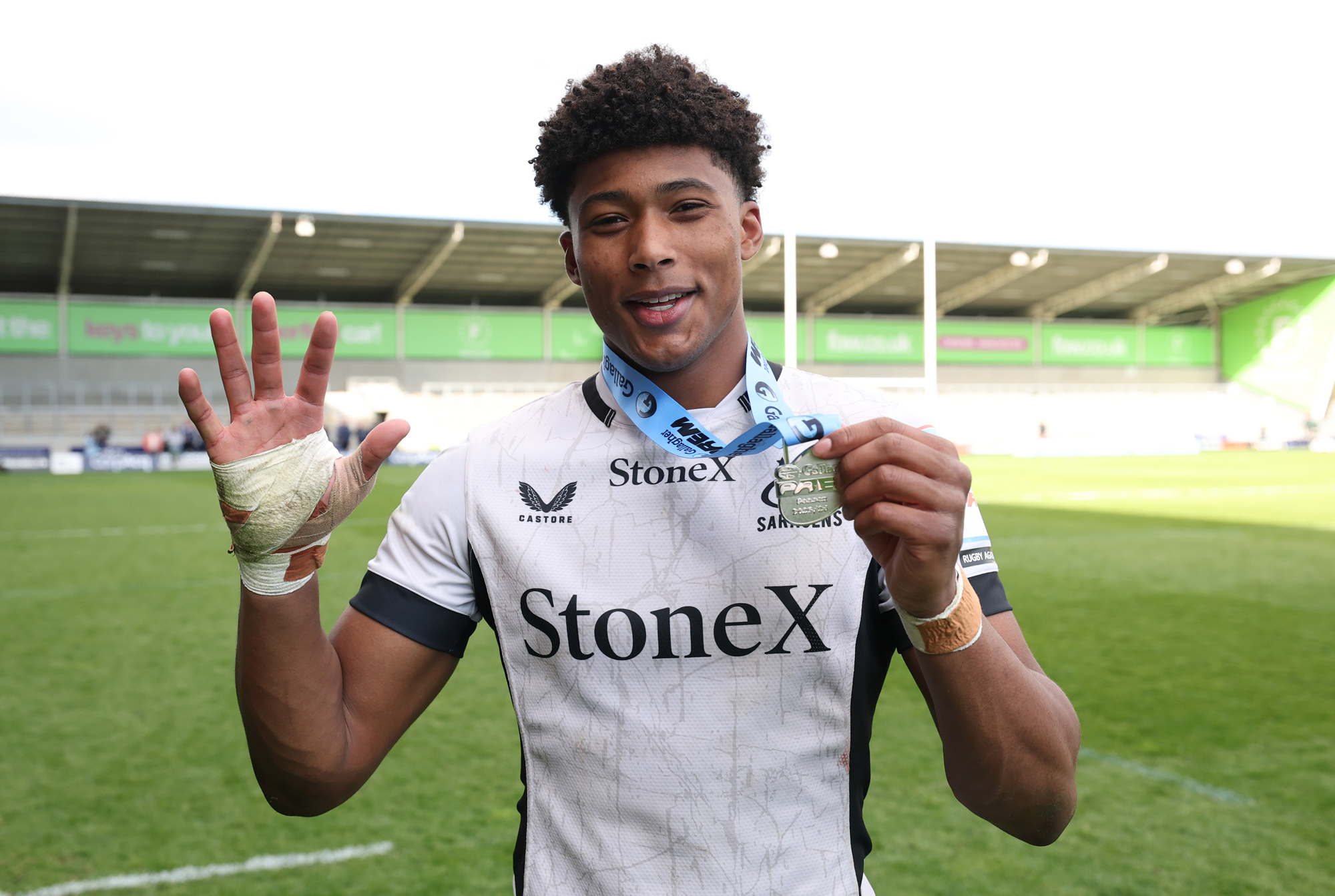 Saracens' Noah Caluori poses with his player of the match medal after the April 2026 match against Sale Sharks