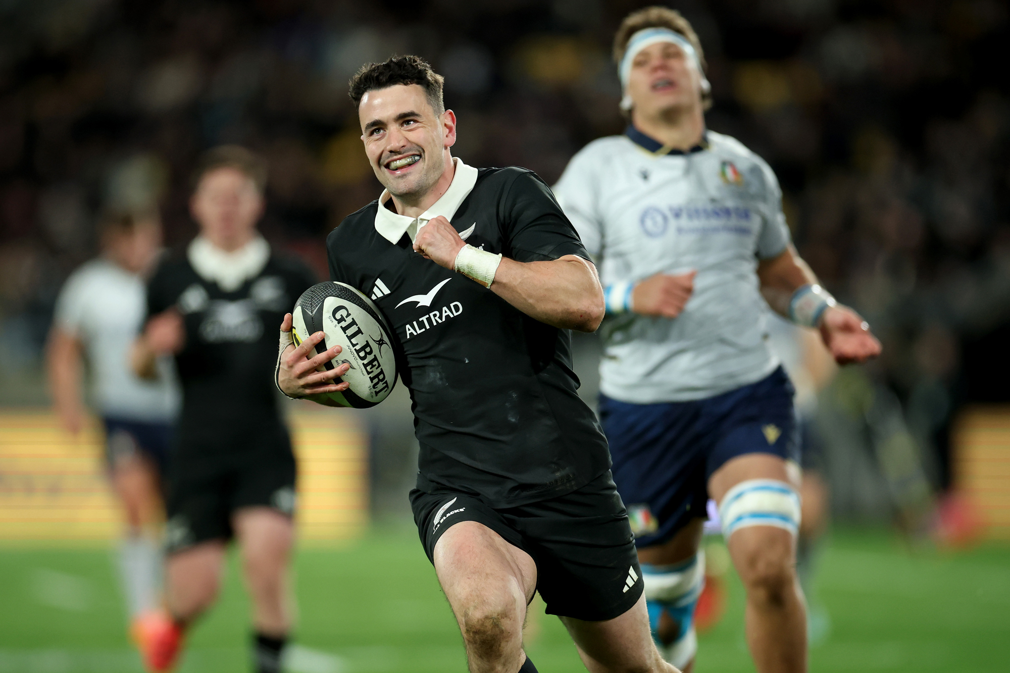 Will Jordan on his way to scoring a try for the All Blacks during the July 2026 Nations Championship match against Italy