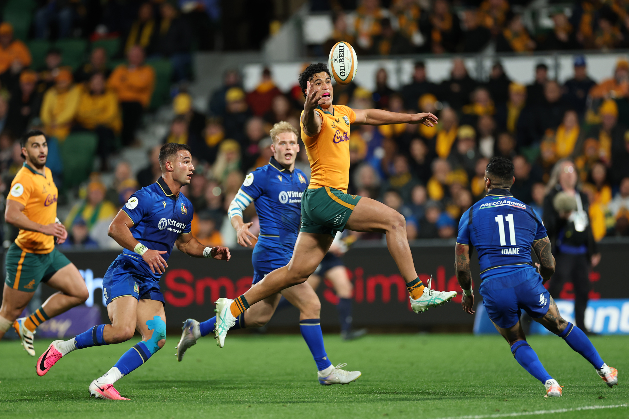 Australia's Joseph-Aukuso Suaalii jumps for the ball during the July 2026 Nations Championship match against Italy