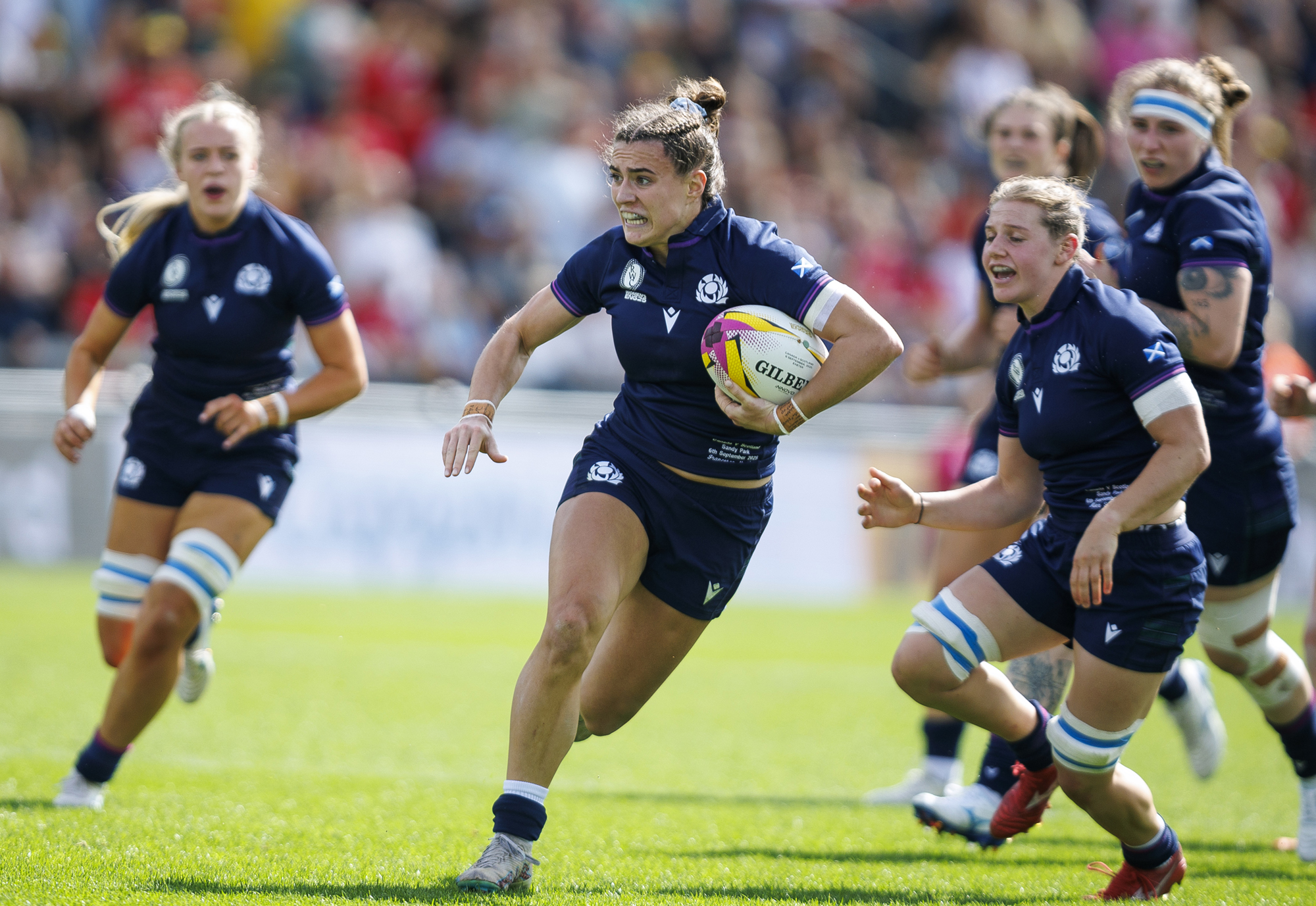 Scotland's Francesca McGhie runs with the ball during the Women's Rugby World Cup 2025 match against Canada