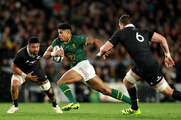 Sacha Feinberg-Mngomezulu of South Africa makes a break during the 2025 Rugby Championship match against New Zealand at Eden Park, Auckland