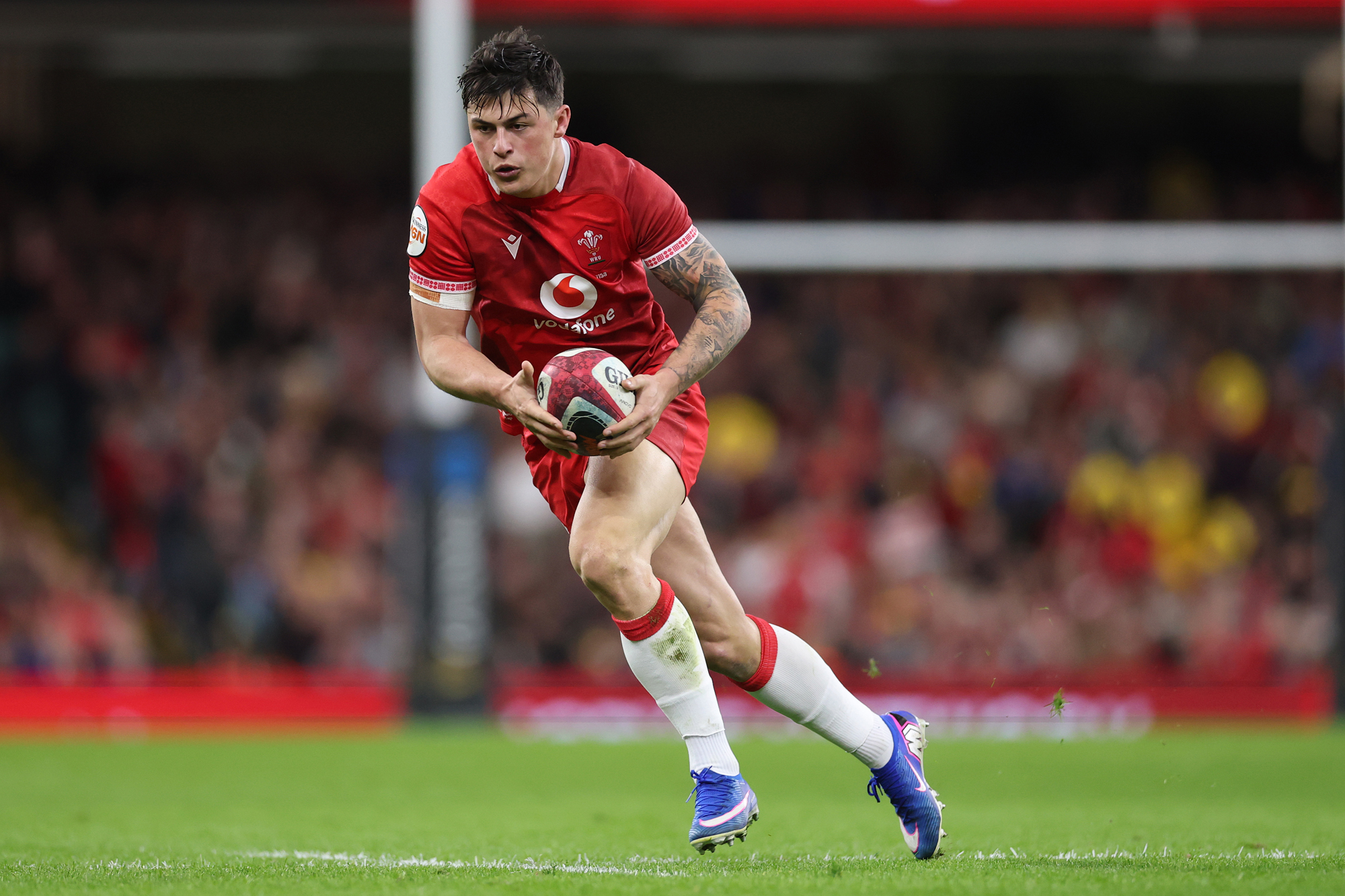 Wales' Louis-Rees Zammit runs with the ball during his team's 2026 Six Nations victory over Italy