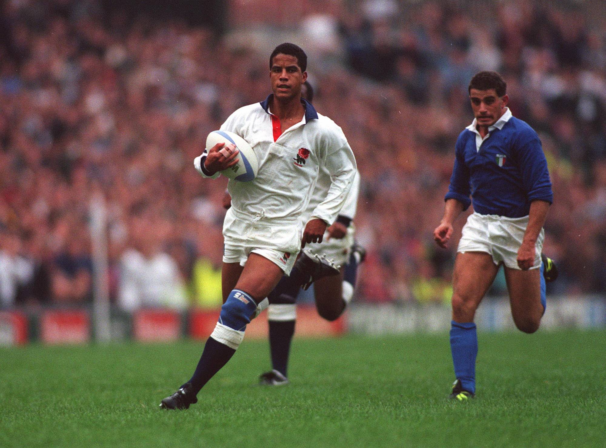 England's Jeremy Guscott on the way to scoring a try against Italy during the 1991 Rugby World Cup