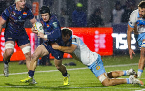 Edinburgh's Darcy Graham is tackled during a January 2026 URC match against the Bulls.