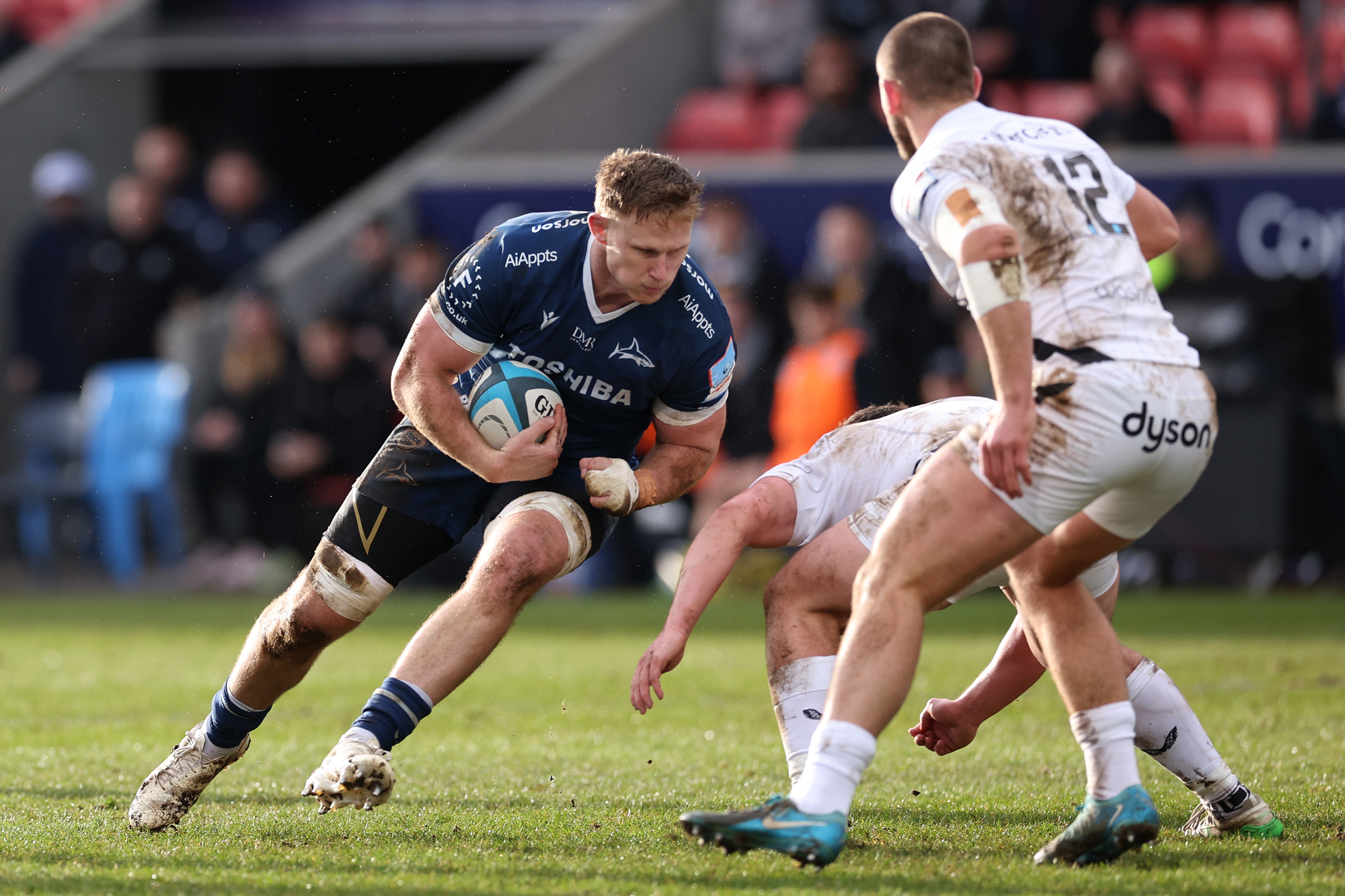 Dan du Preez of Sale Sharks is tackled by Kieran Verden of Bath during a PREM Cup match in February 2026.