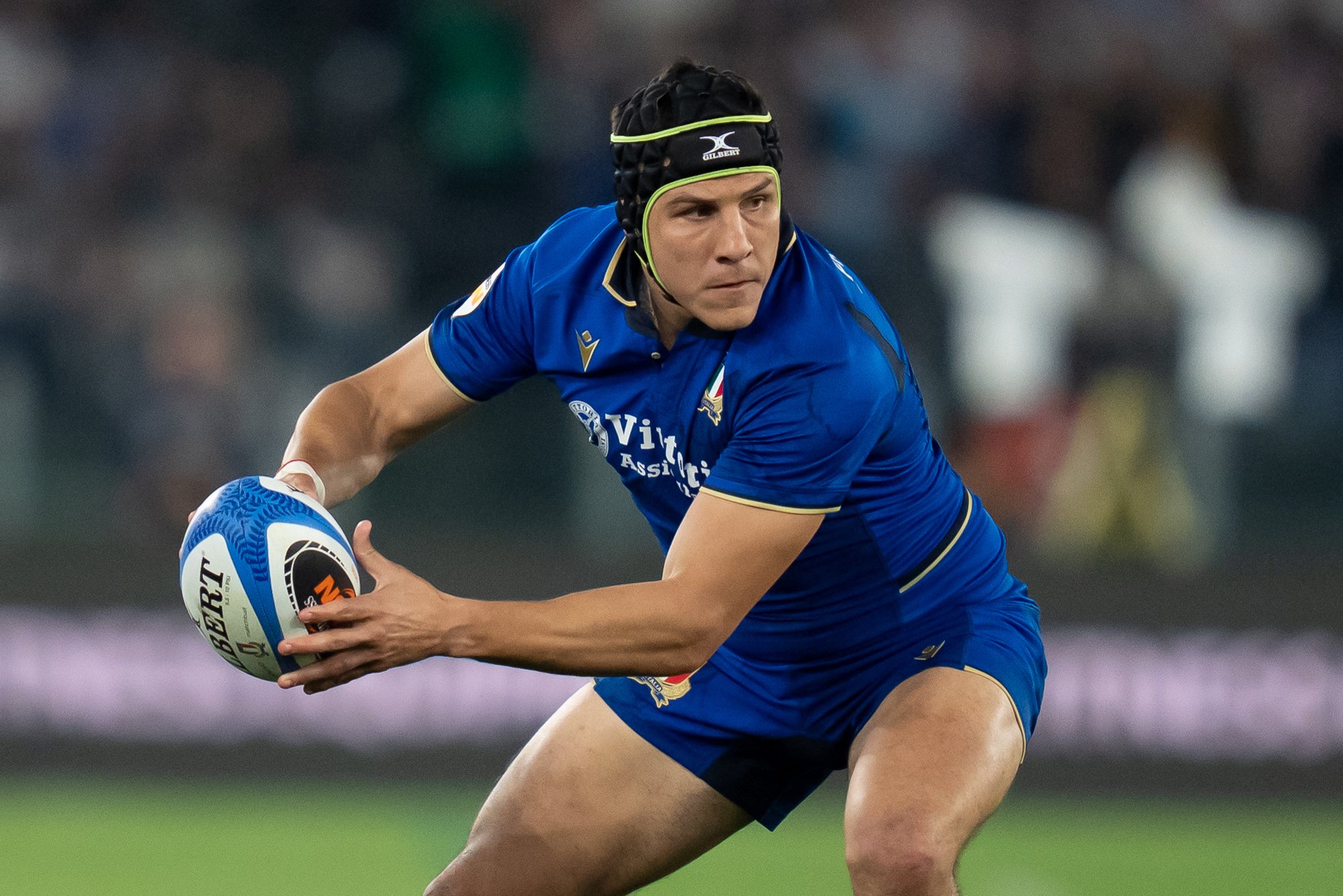 Italy’s Manuel Zuliani prepares to pass the ball during Italy's 2026 Six Nations win over England