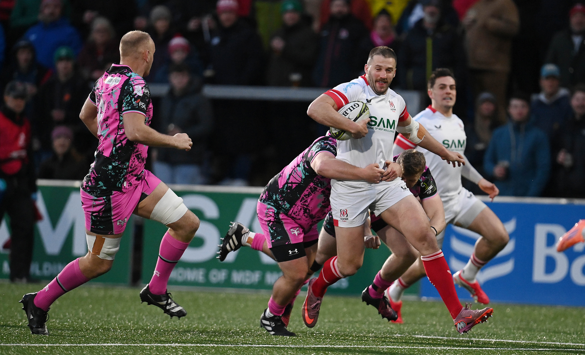 Ulster's Stuart McCloskey carries the ball during the April 2026 URC match against Ospreys