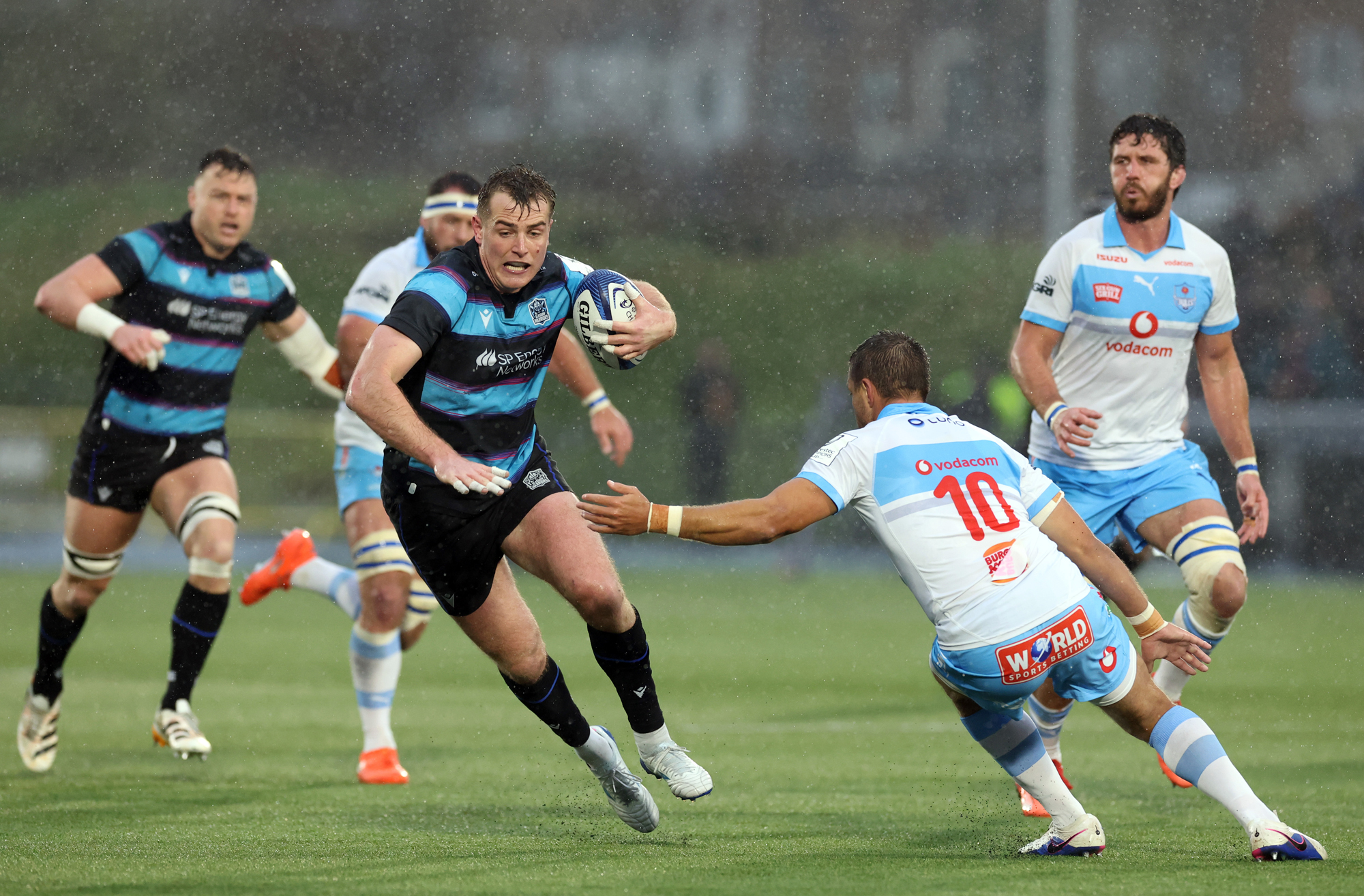 Glasgow Warriors' Stafford McDowall runs with the ball during the April 2026 Champions Cup match against the Bulls.