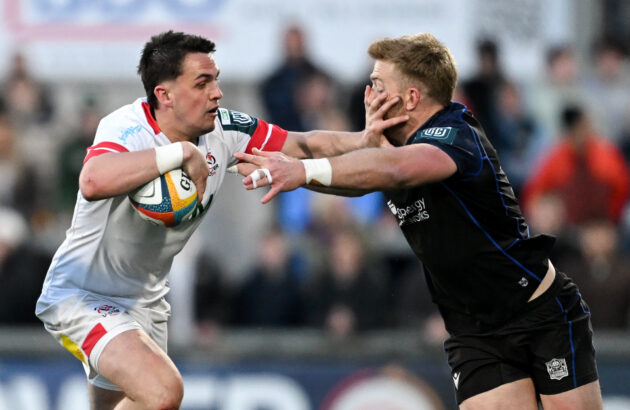 Ulster’s James Hume hands off Glasgow Warriors' James Hume during the May 2026 URC encounter
