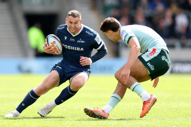 Orlando Bailey of Leicester Tigers moves to tackle Tom Roebuck of Sale Sharks during a May 2026 Gallagher PREM match