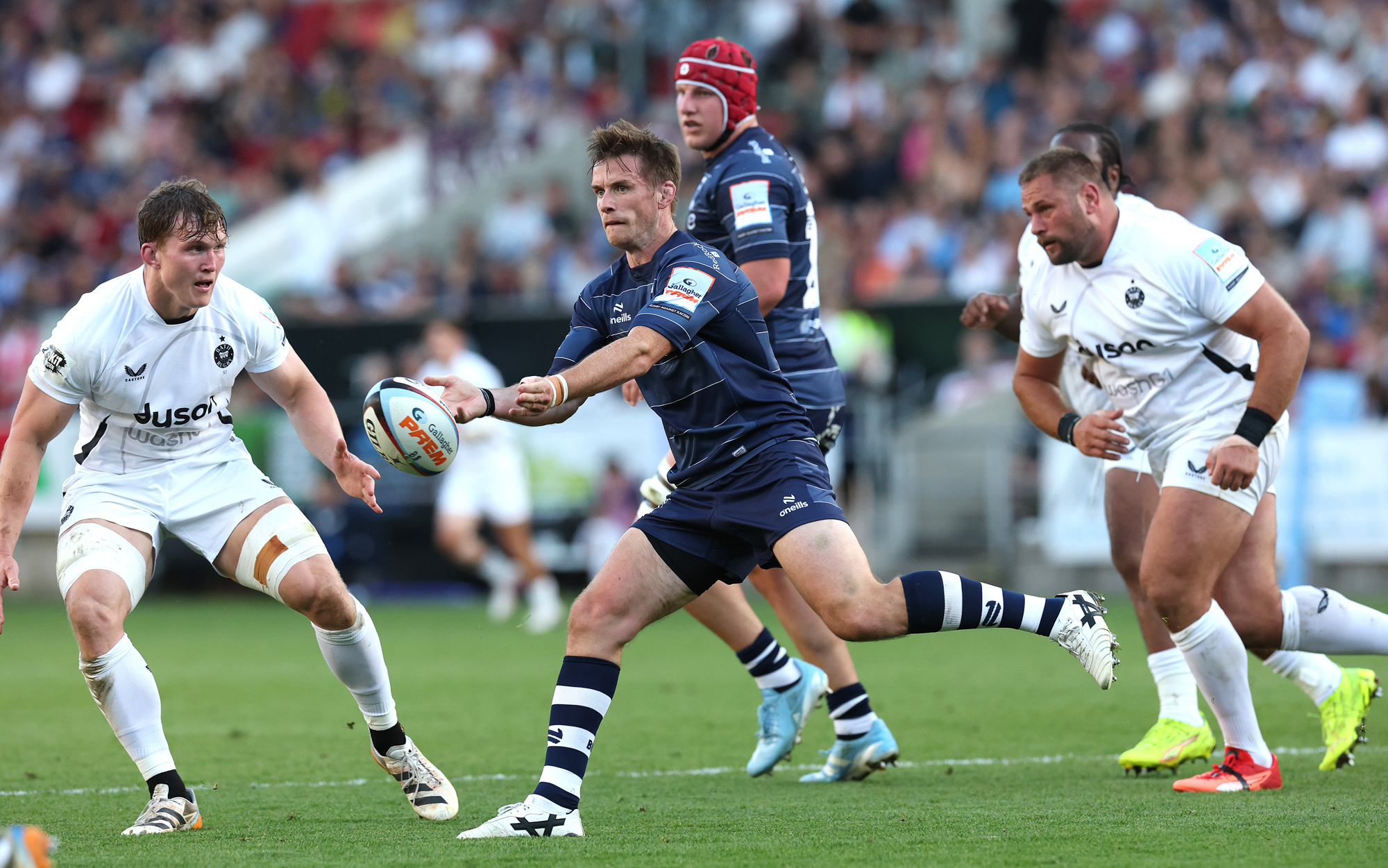 Bristol Bears’ AJ MacGinty passes the ball during the May 2026 Gallagher PREM match against Bath Rugby