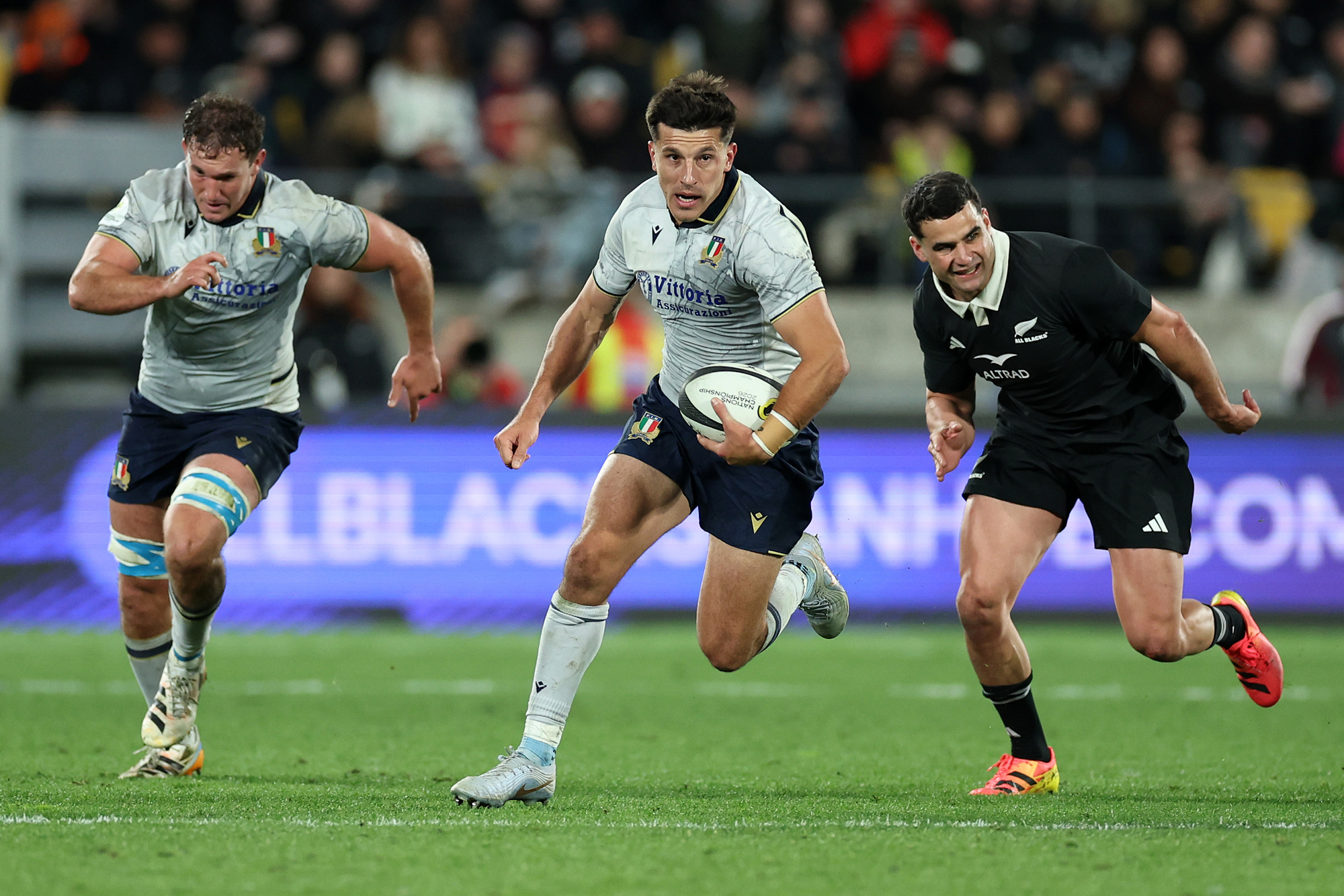 Italy’s Tommaso Allan runs with the ball during the July 2026 Nations Championship match against New Zealand