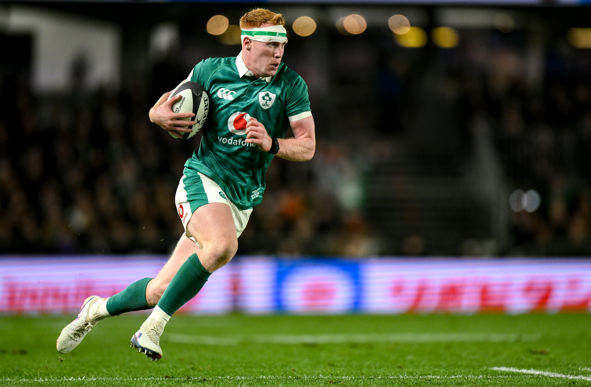 Ireland's Ciarán Frawley runs with the ball during the July 2026 Nations Championship match against New Zealand.