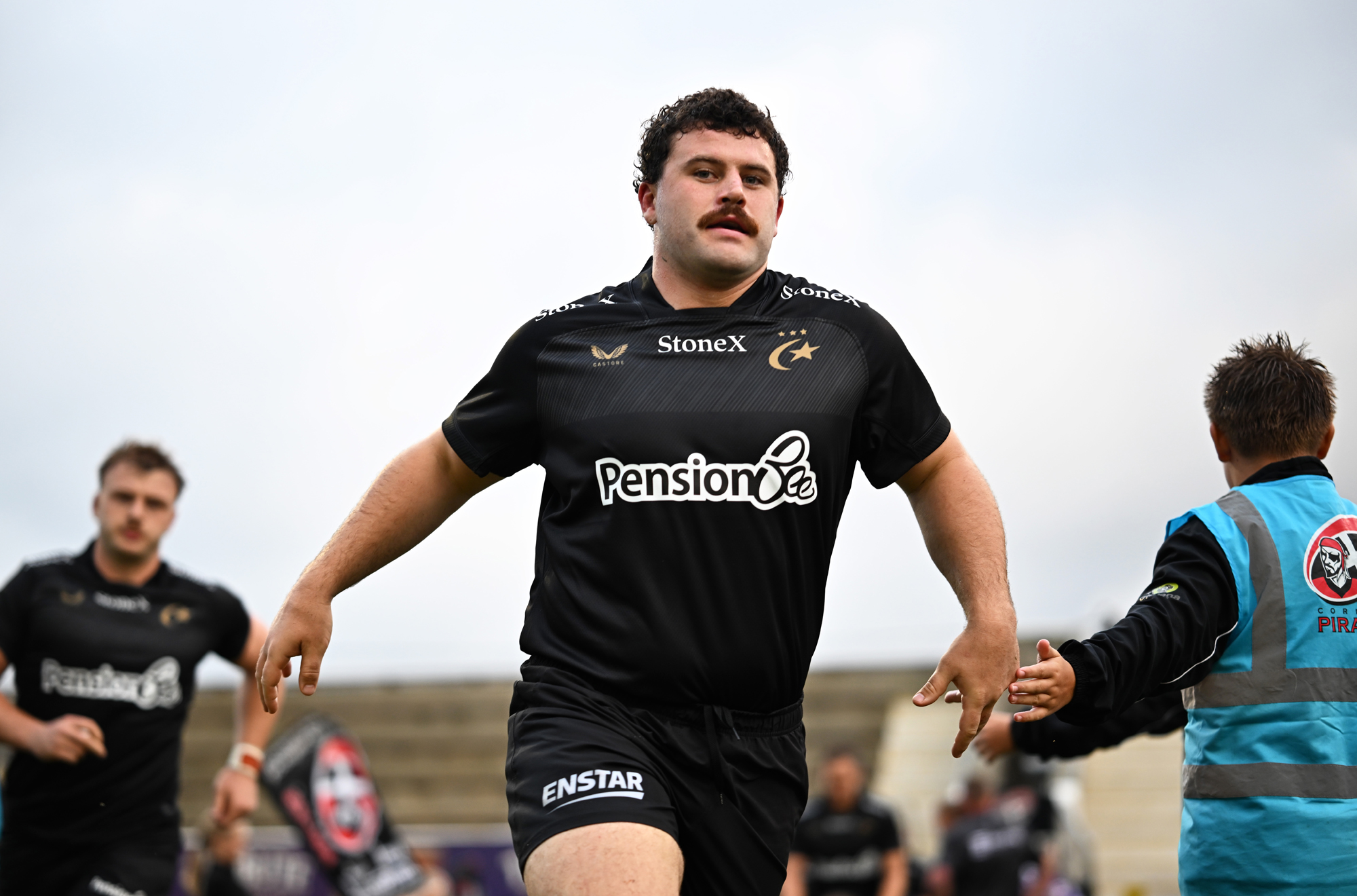 Saracens' Alfie Barbeary runs across the pitch during a pre-season match against Cornish Pirates in August 2026