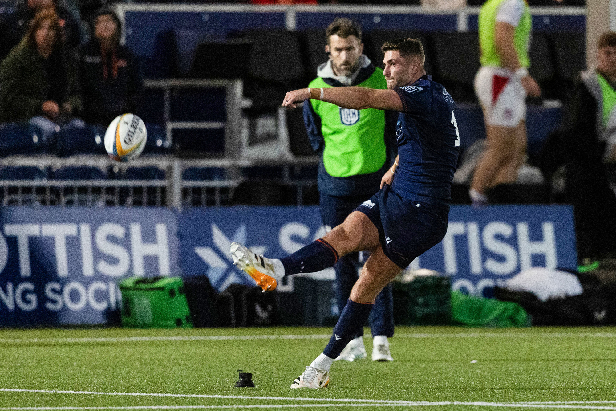 Edinburgh's James Grayson kicks at goal during a friendly match against Ulster ahead of the 2026-27 season.