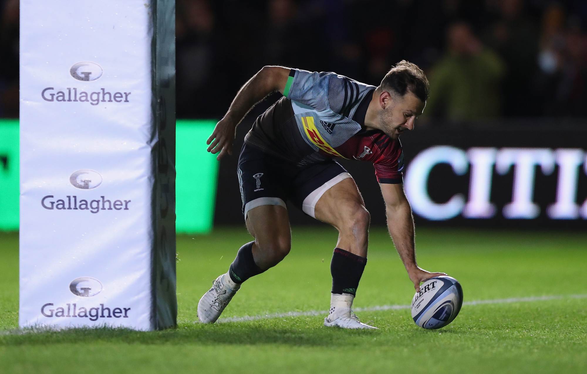 Danny Care touches the ball down for Harlequins during an October 2018 match against Saracens