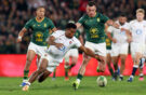 England's Immanuel Feyi-Waboso races South Africa's Jesse Kriel to the ball during a 2026 Nations Championship match