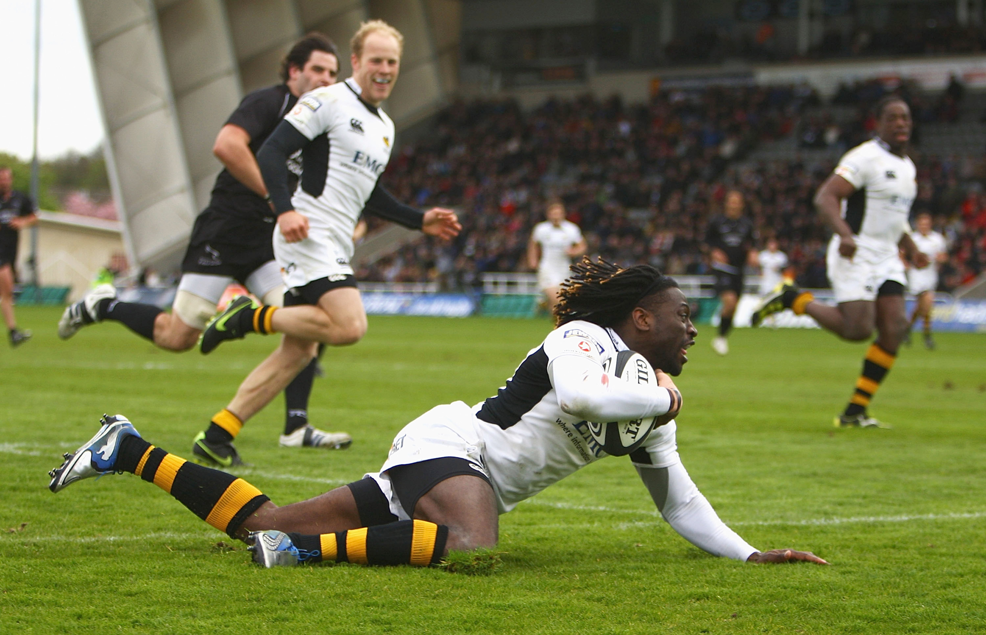 Wasps' Paul Sackey scores during a 2010 match against Newcastle Falcons